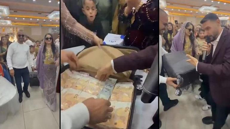 Görülmemiş düğün! Gelin ve damada paradan yelek, dolarlı taç takıldı 1 Görülmemiş düğün! Gelin ve damada paradan yelek, dolarlı taç takıldı